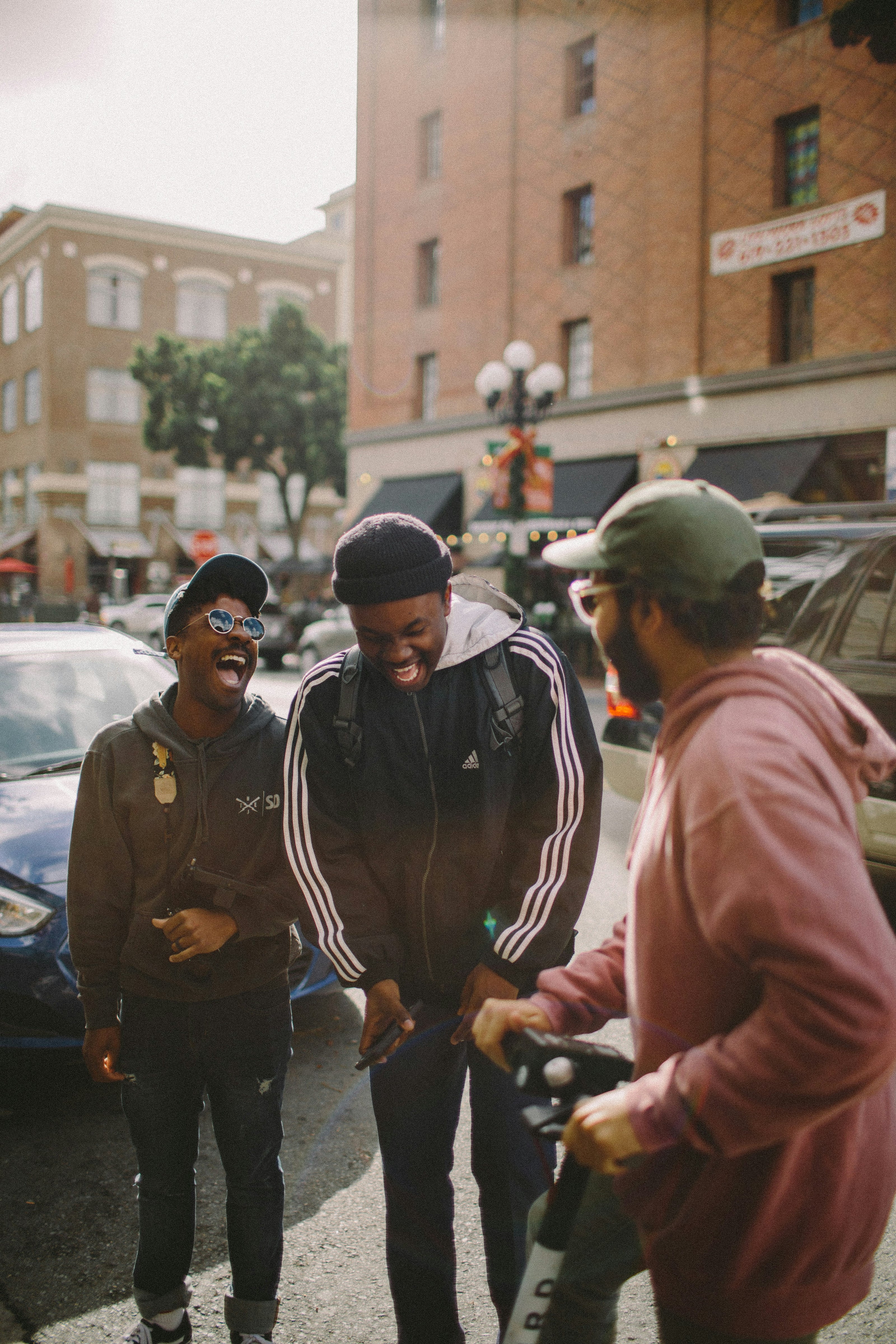 three male friends laughing and having fun